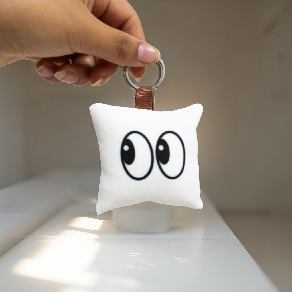 Llavero Almohadita Mirada de Reojo